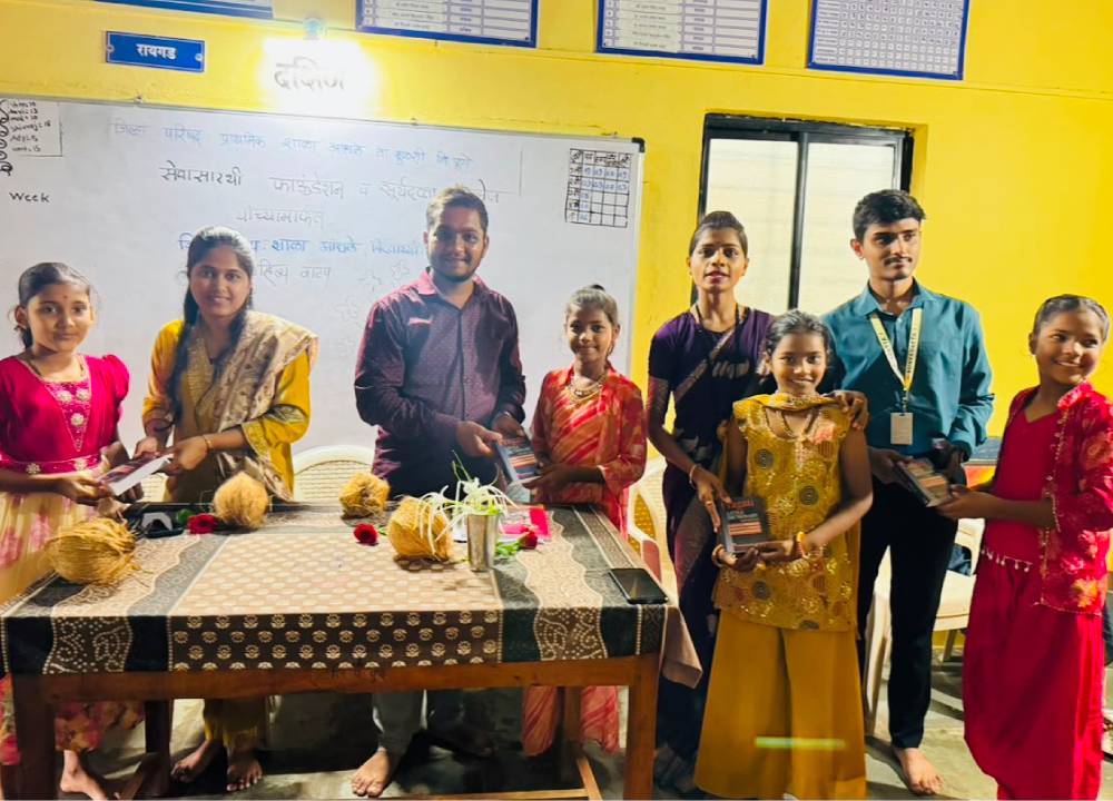Suryadatta Distributes School Kits and Umbrellas