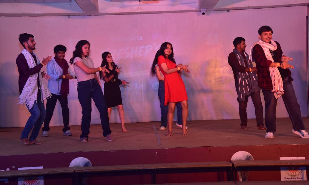 MBA, MCA, BBA and BCA students participating in dance and music competitions at Freshers Fiesta 2026.