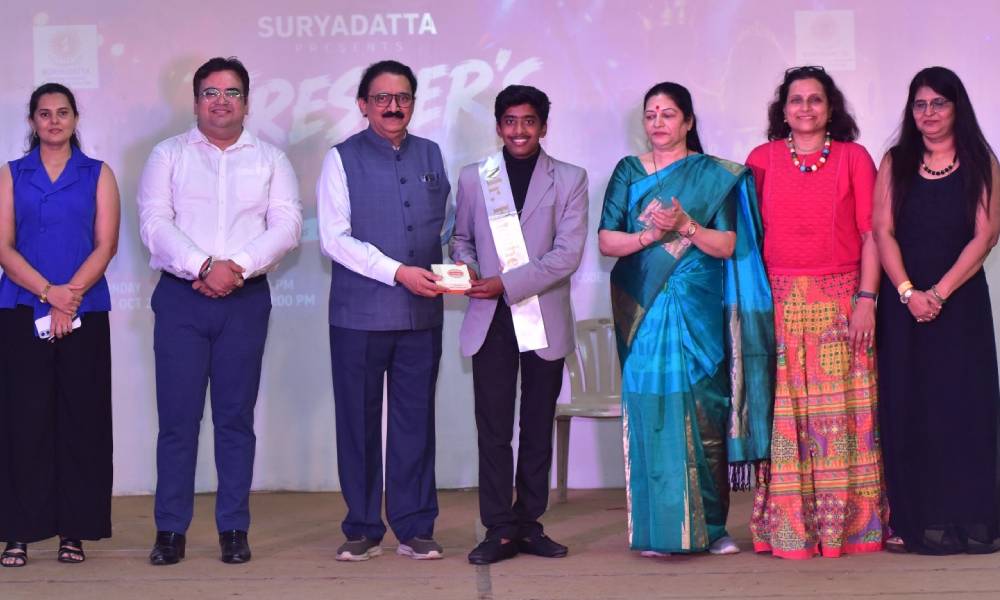 Student winners receiving recognition at Suryadatta Freshers Fiesta 2026.