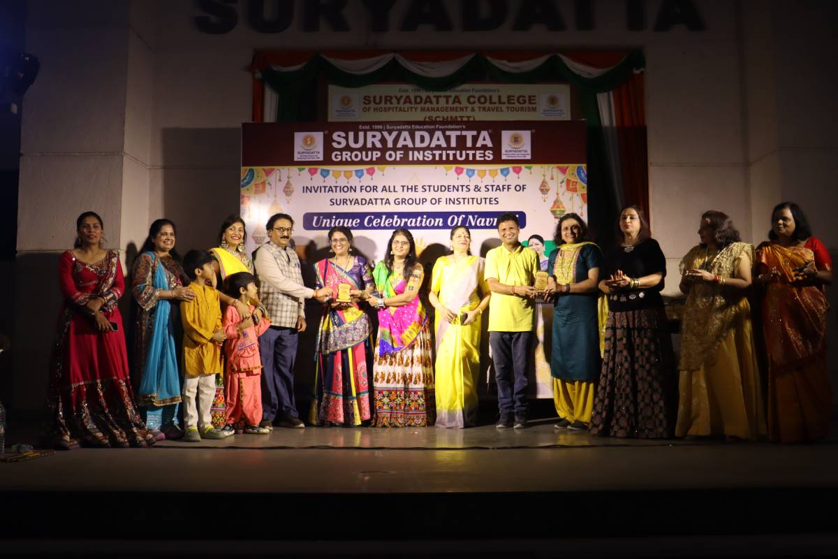 Navrang Garba 2026 faculty trophy recognising faculty participation and achievements during the celebration at Suryadatta Bavdhan Campus.